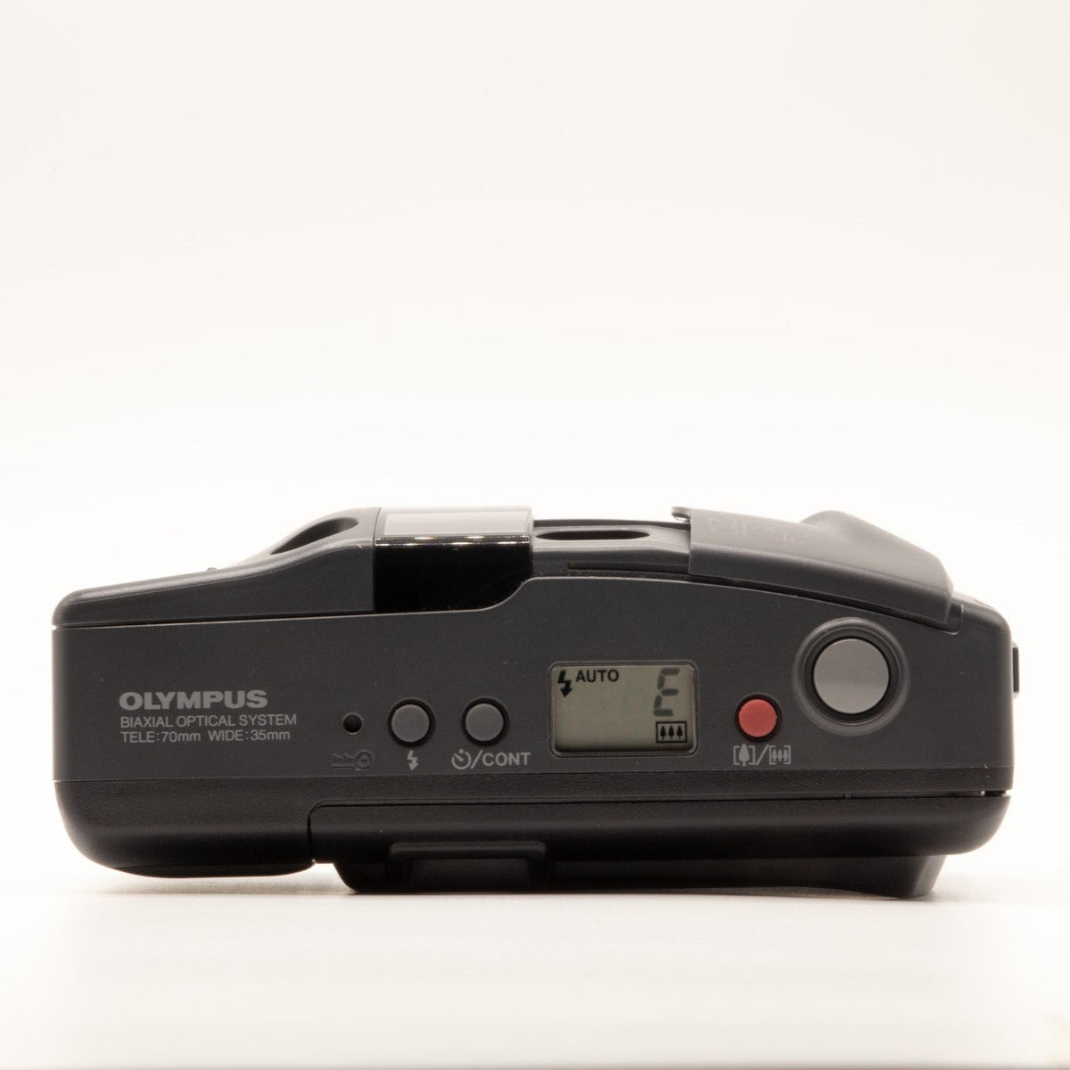 Top plate of the Olympus AF-10 Twin 35mm film camera showing shutter button and dials