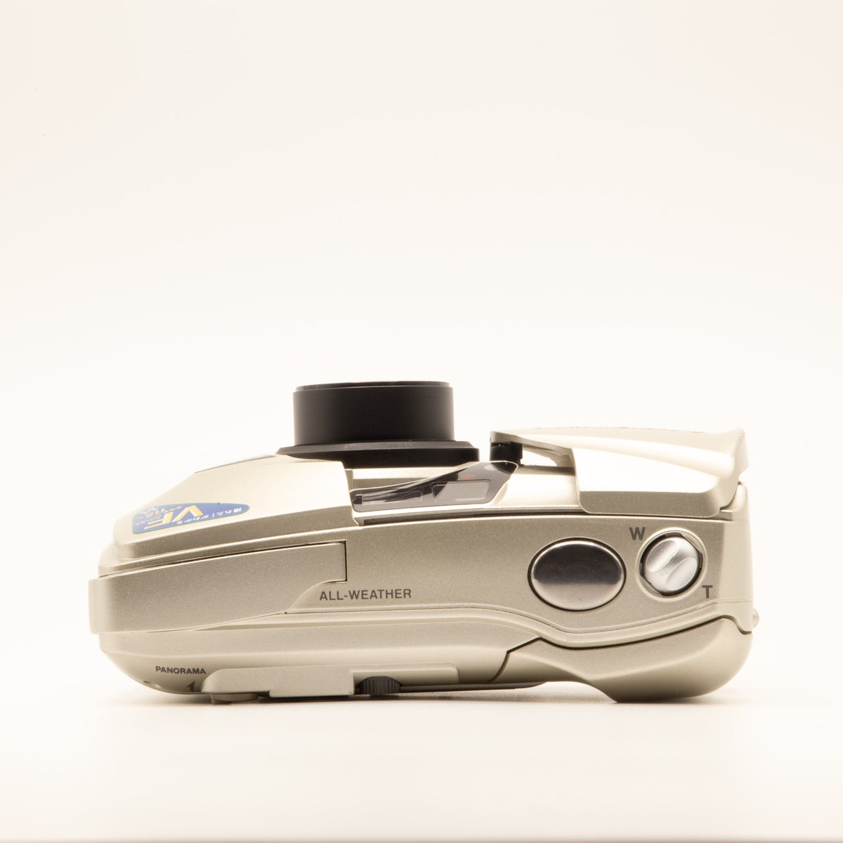 Top plate of the Olympus MJU II 115 VF 35mm film camera showing shutter button and dials