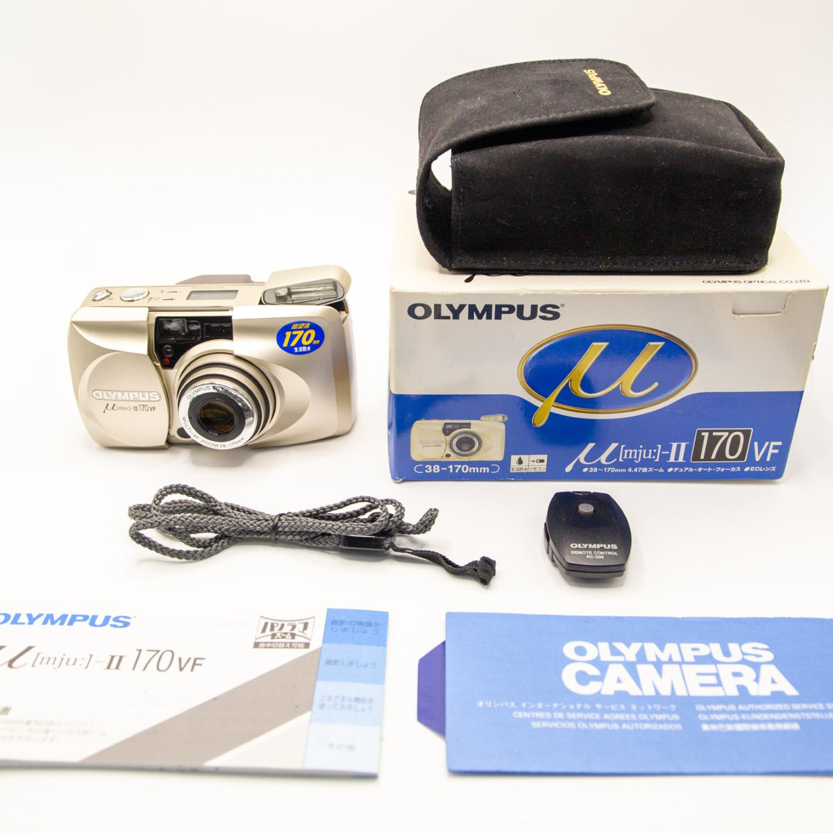 Olympus MJU II 170 VF 35mm film camera bundle deal – includes original OEM accessories such as the strap, remote and box