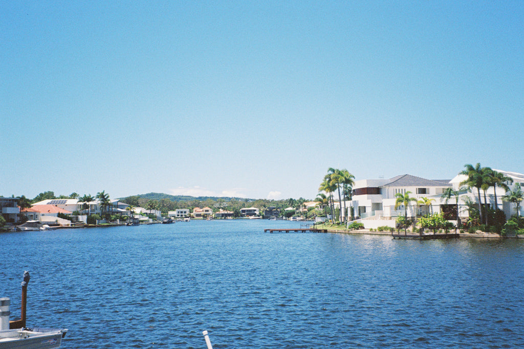 Houses sitting by the water