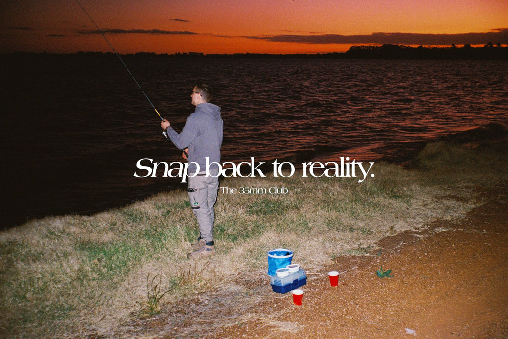 Our slogan 'Snap back to reality' over a photo of a man fishing by a lake at sunset