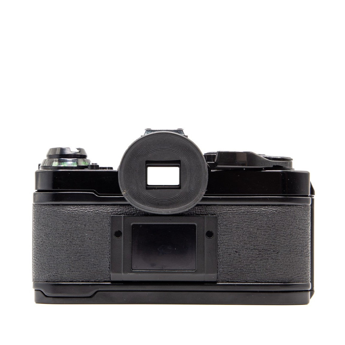 Top plate of the Canon AE-1 Program 35mm film camera showing shutter button and dials