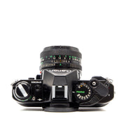 Canon AE-1 Program 35mm SLR Film Camera with FD 50mm f/1.8 Lens