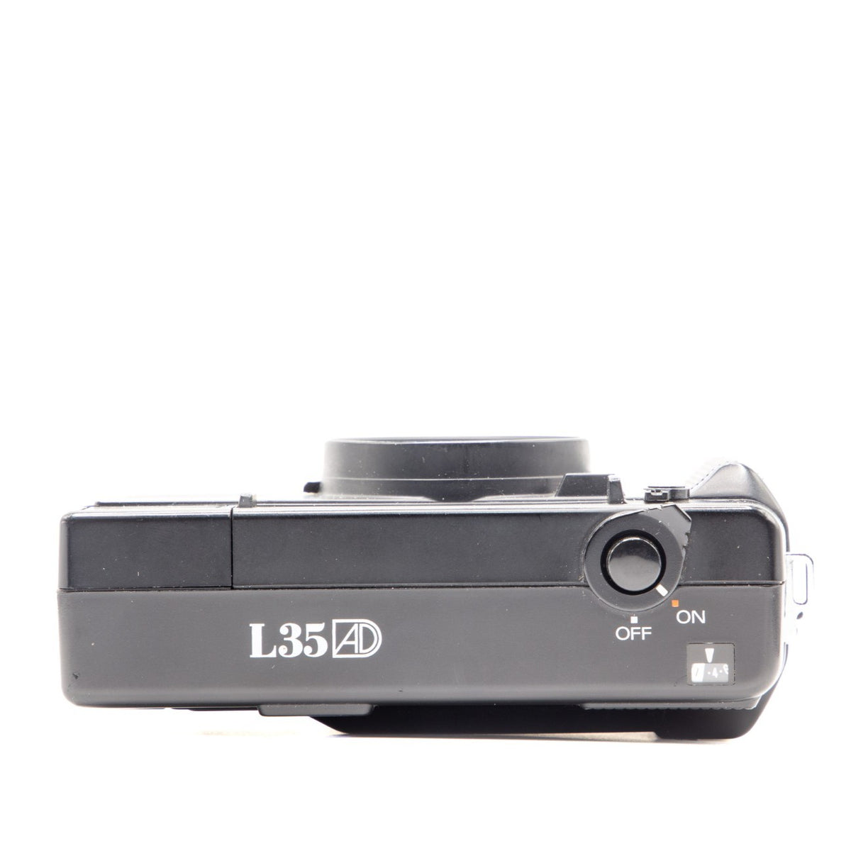 Top plate of the Nikon L35AD 35mm film camera showing shutter button and dials