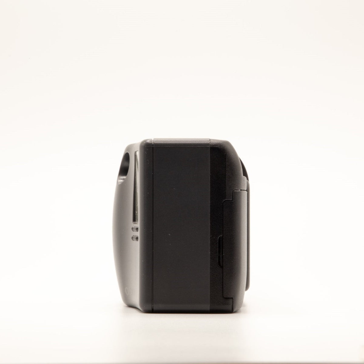 Side view of the Olympus AF-10 Twin vintage 35mm film camera body