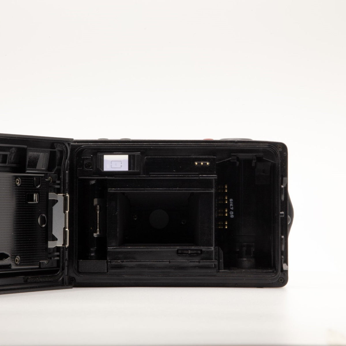 Internal view of the Olympus AF-10 Twin lens mechanism and mechanics – 35mm film camera close-up
