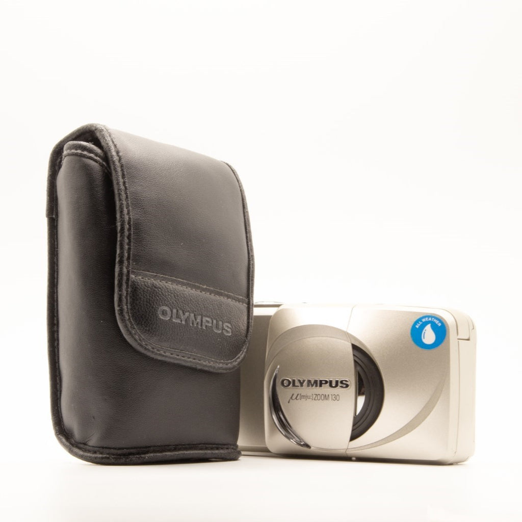 A leather film camera case for Olympus film cameras