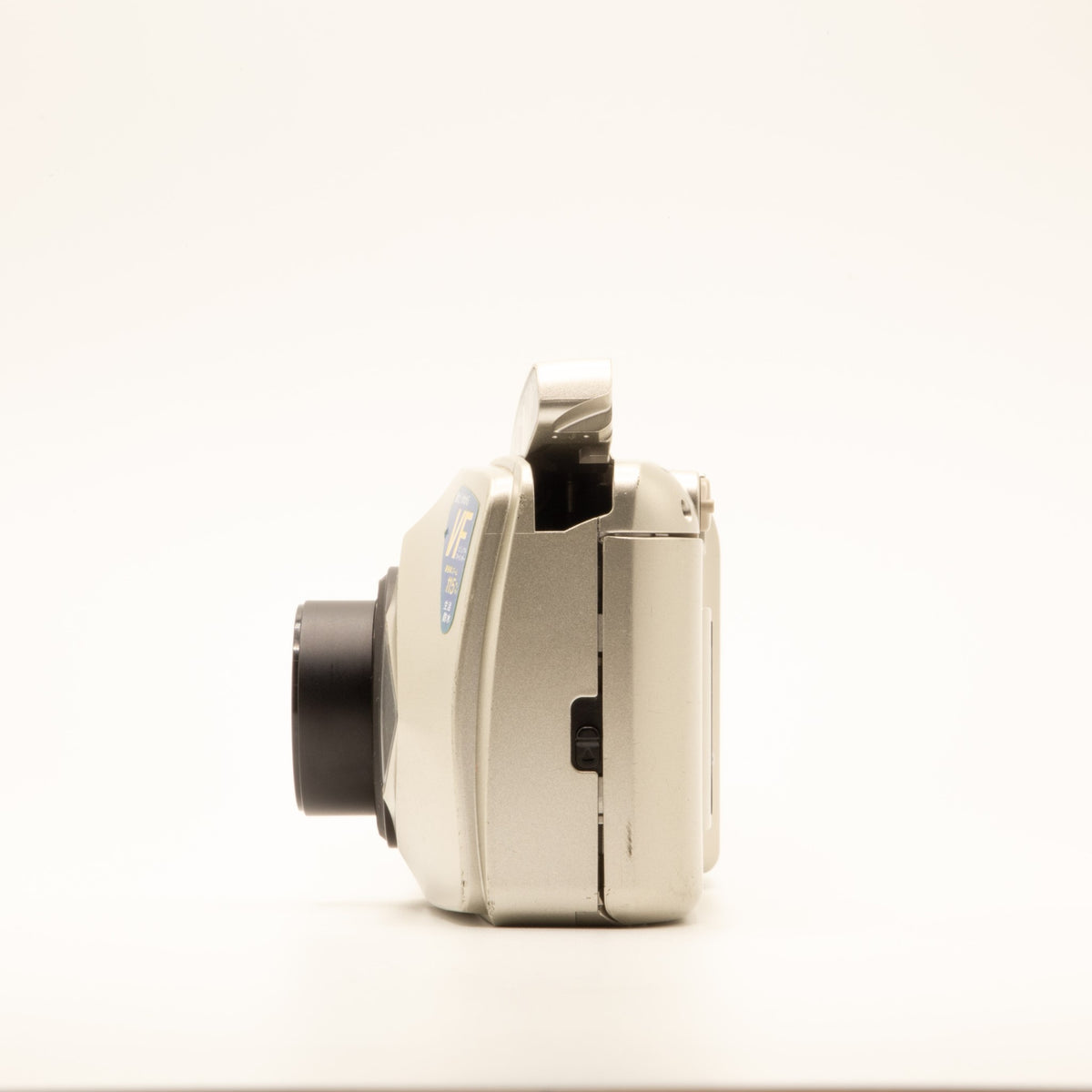 Side view of the Olympus MJU II 115 VF vintage 35mm film camera body