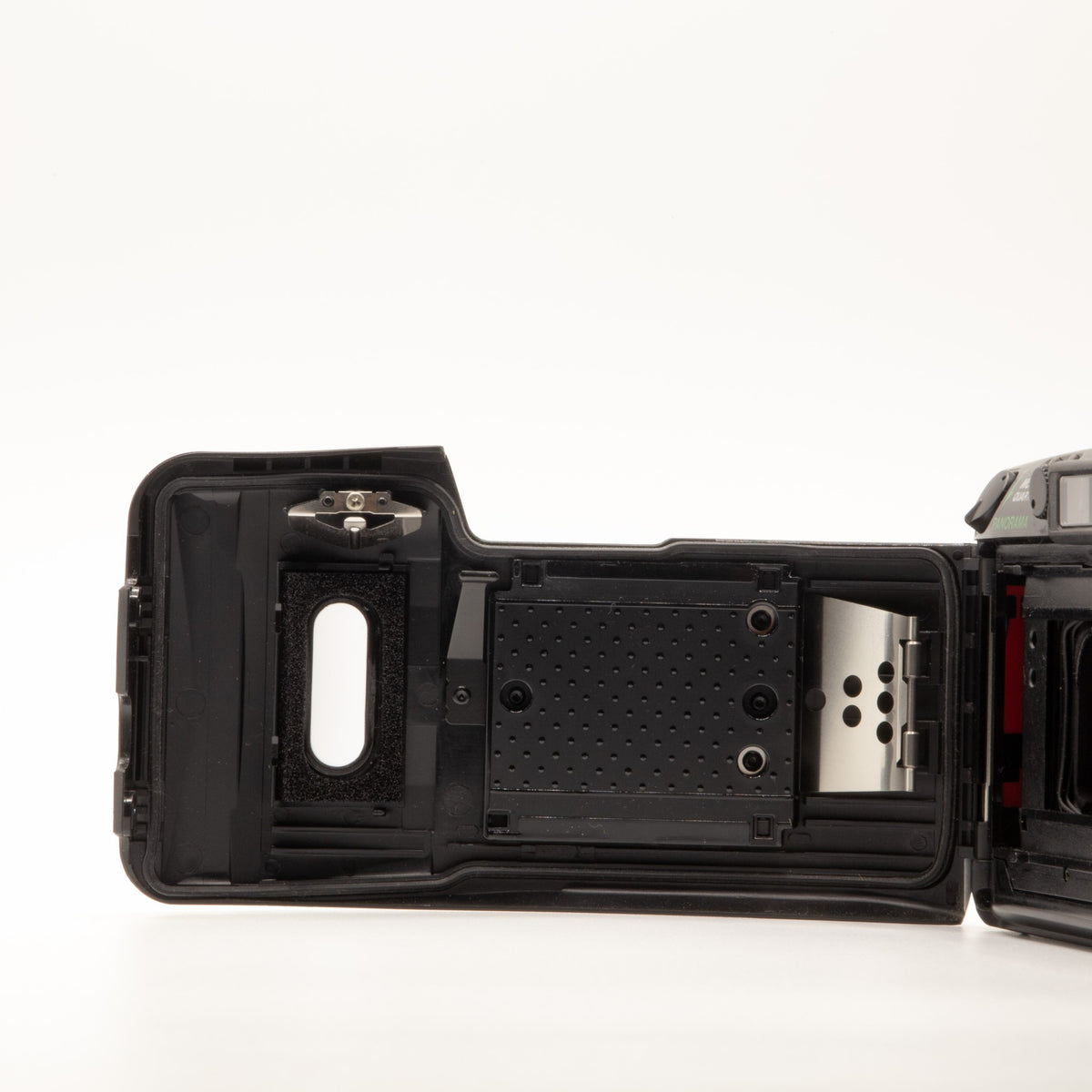 Olympus MJU Zoom 105 film chamber door internals, showing the 35mm film loading mechanism