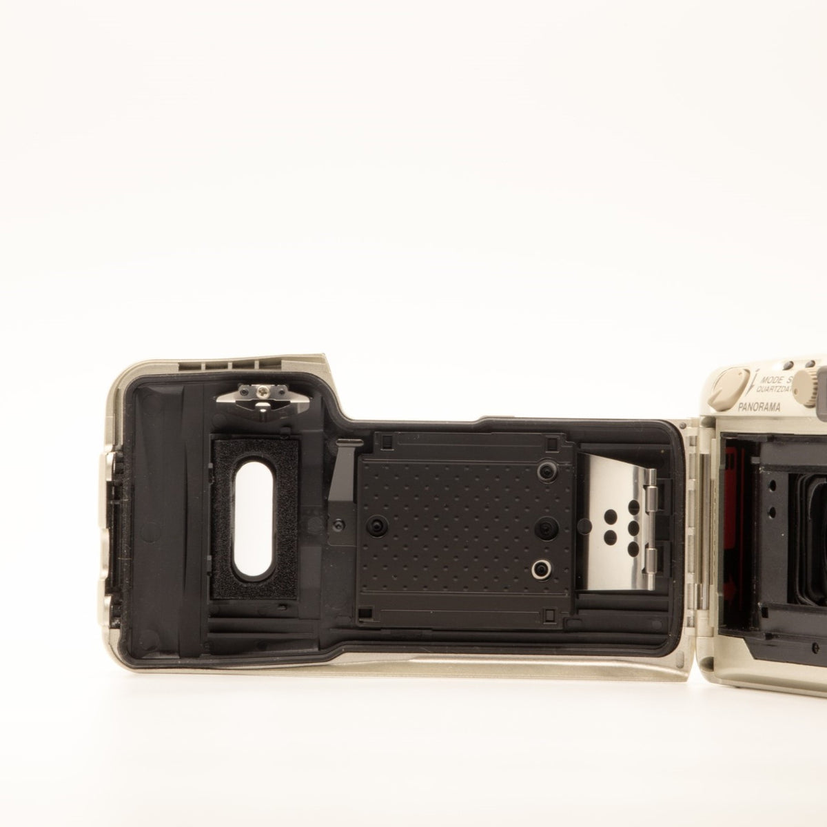 Olympus MJU Zoom 105 Deluxe film chamber door internals, showing the 35mm film loading mechanism