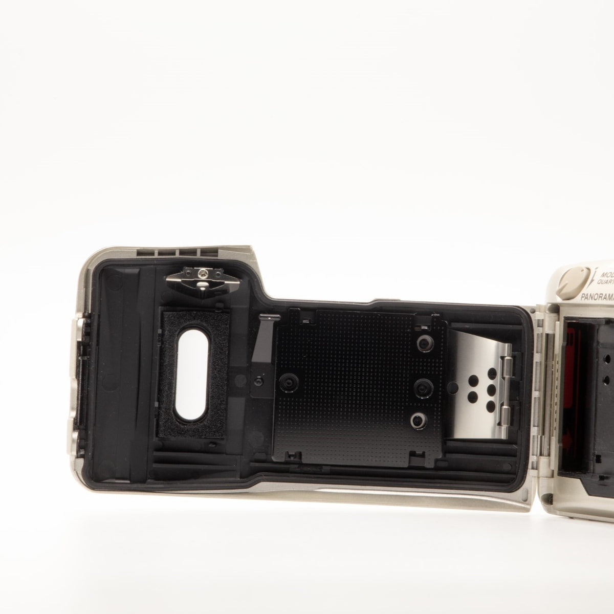 Olympus MJU Zoom 115 film chamber door internals, showing the 35mm film loading mechanism