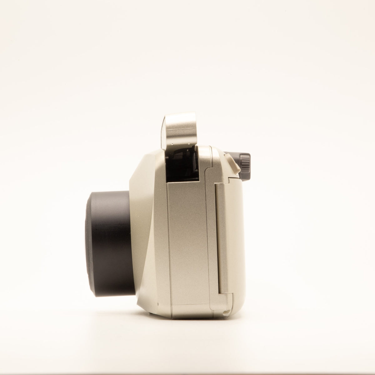 Side view of the Olympus MJU Zoom 140 vintage 35mm film camera body