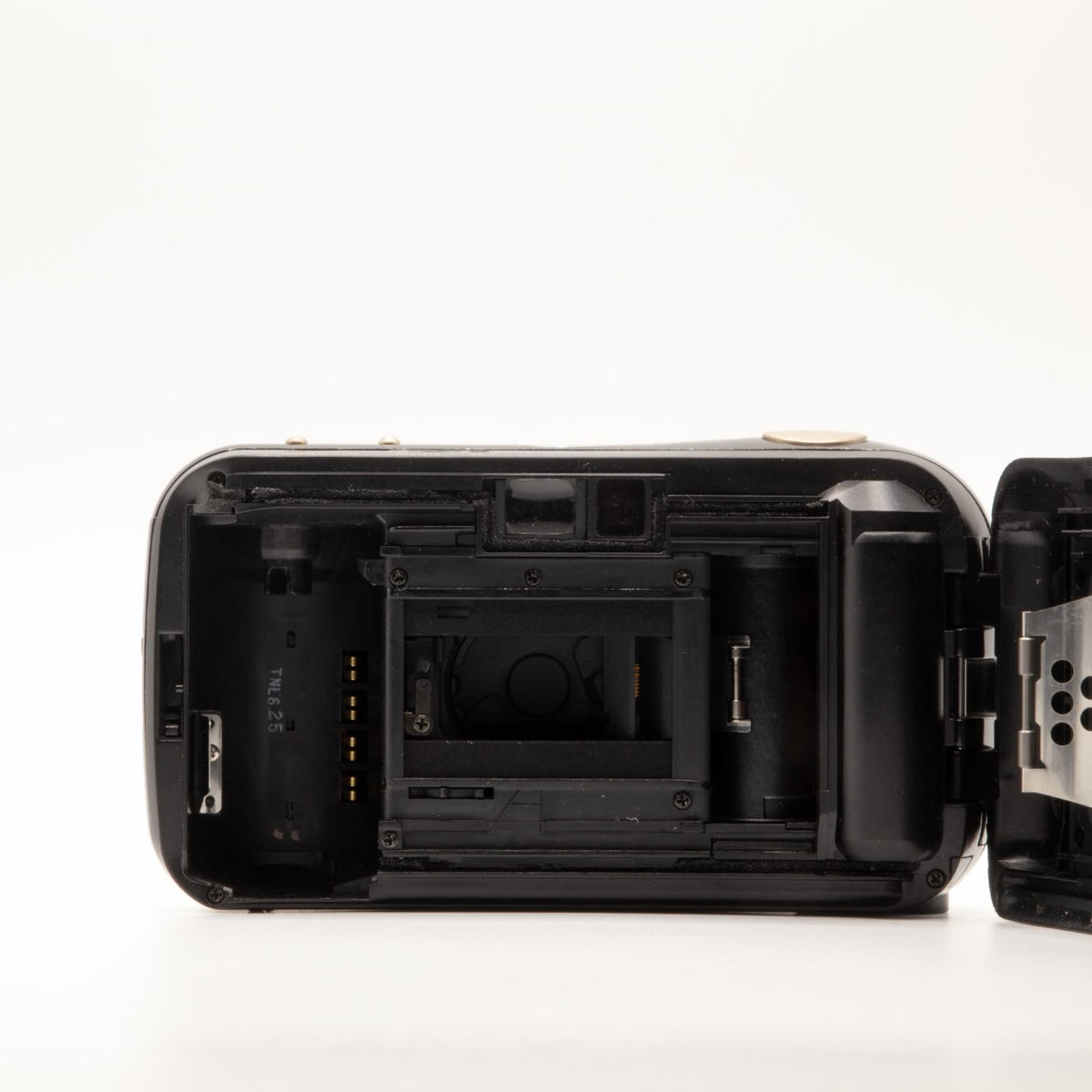 Internal view of the Olympus MJU I Panorama lens mechanism and mechanics – 35mm film camera close-up