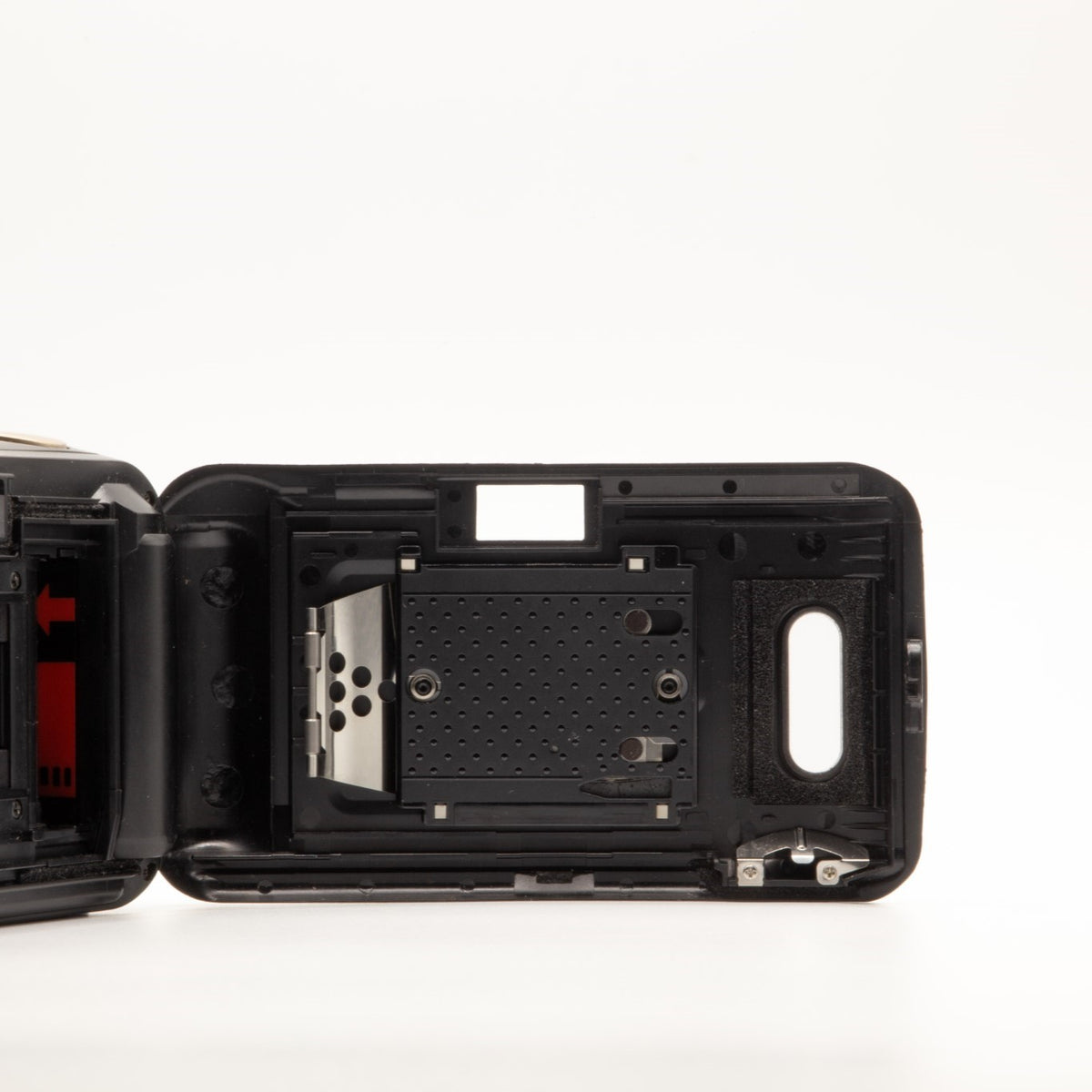 Olympus MJU I Panorama film chamber door internals, showing the 35mm film loading mechanism